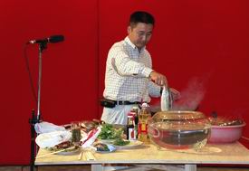 Stewart(China tour consultant) is preparing for cooking lessions(click to enlarge)