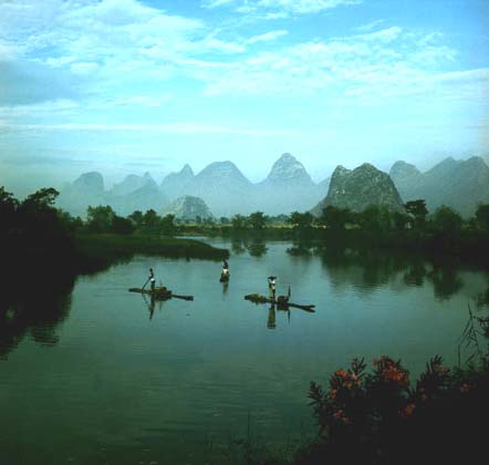 fisherman and fishing bird on li river,yangshuo (Click to see details)